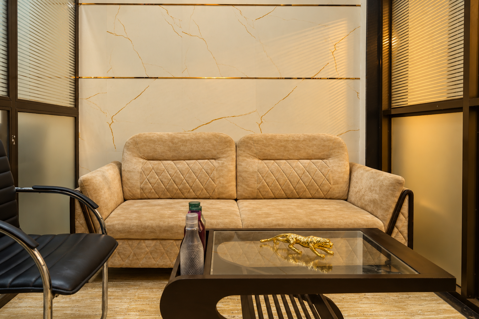 Beige quilted sofa in a waiting area